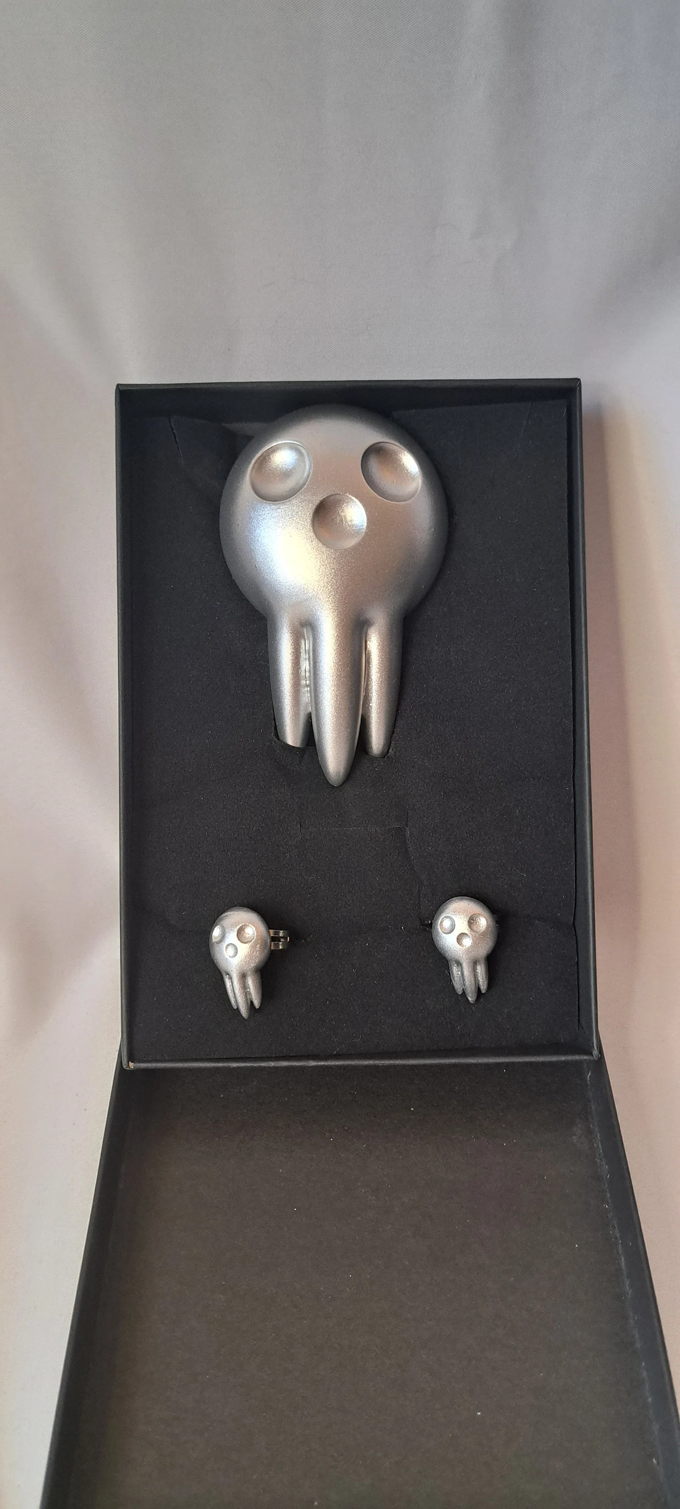 Death the Kid rings and brooch